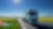 Lorry driving on a road next to a rapeseed field