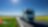 Lorry driving on a road next to a rapeseed field