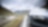 car driving along a winding mountain road