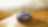  Open top blue car, face on view, driving through the countryside surrounded by mountain scenary