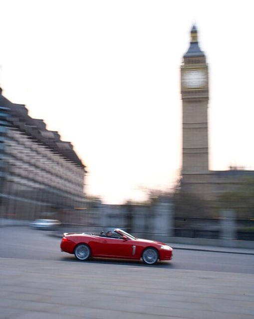 Car on the street in front of Big Ben