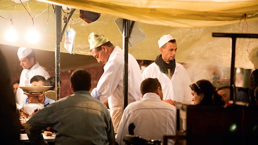 Chef serving people delicious food