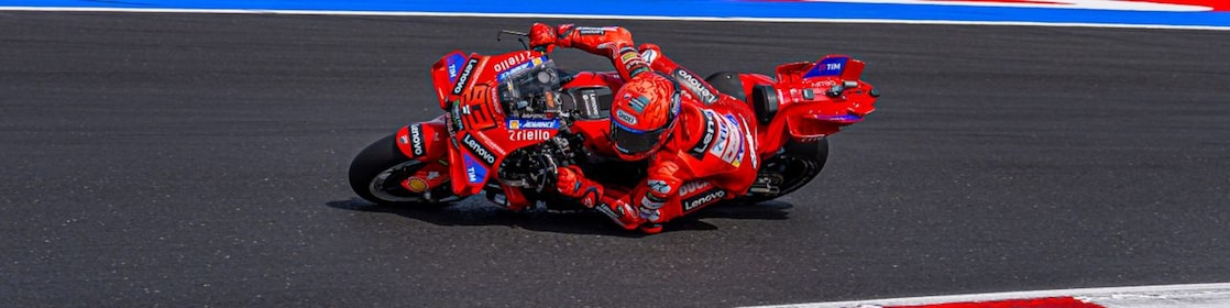 A man driving a motorcycle using extraordinary engine oil.