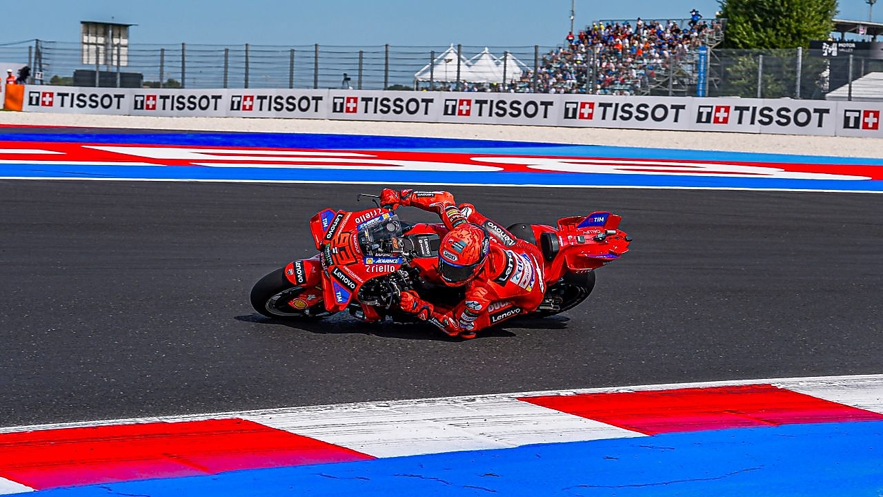 A man driving a motorcycle using extraordinary engine oil.