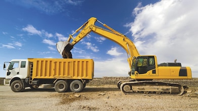 Loading Mud in Truck