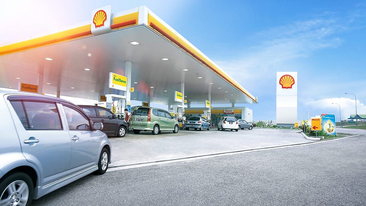 Car pulling at shell retail station