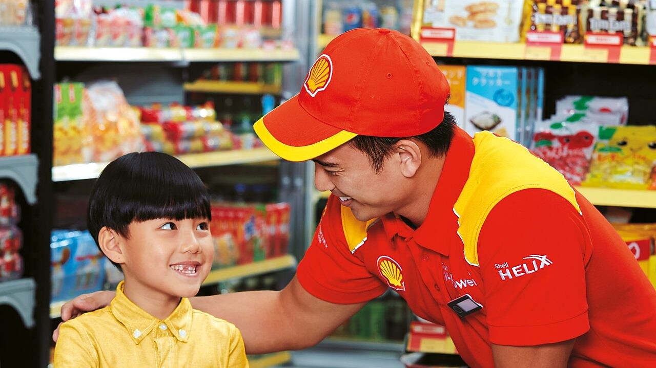 Man and a boy smiling