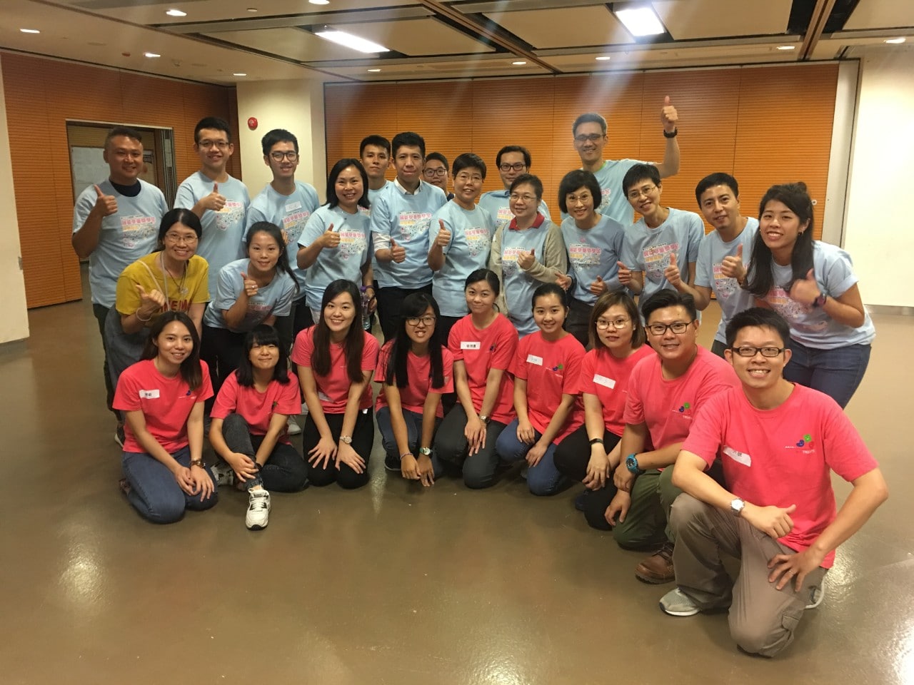 Group photo of volunteers and TREATS, a children social integration organization.