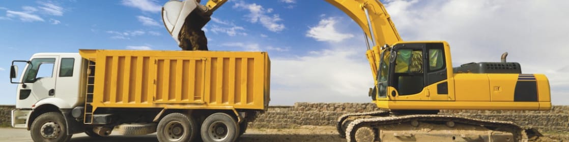 Excavator loading dumper truck