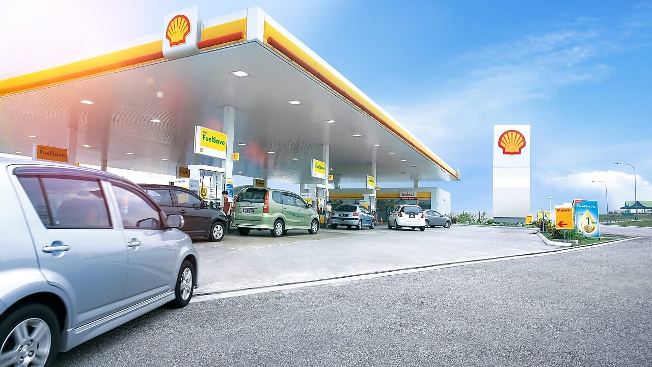 Malaysian assistant greeting guest