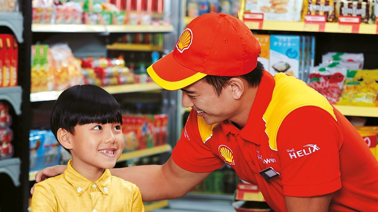 Man and a boy smiling