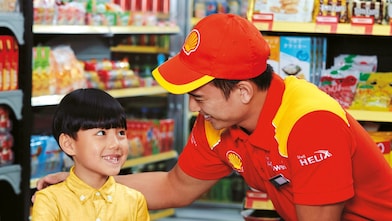 Man and a boy smiling