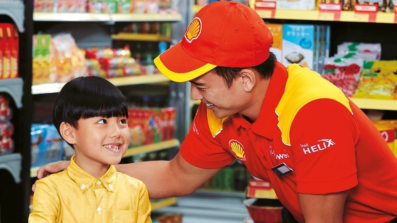 Man and a boy smiling